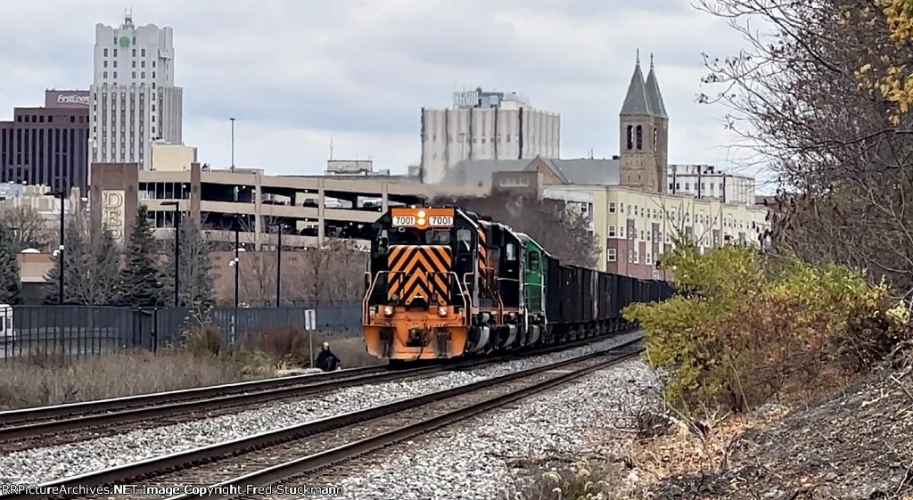 This gentleman waited patiently for the train to pass.